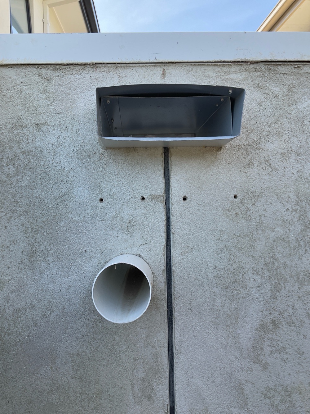 Box gutter overflow not discharging to the atmosphere, recorded during a fixing inspection in Point Cook