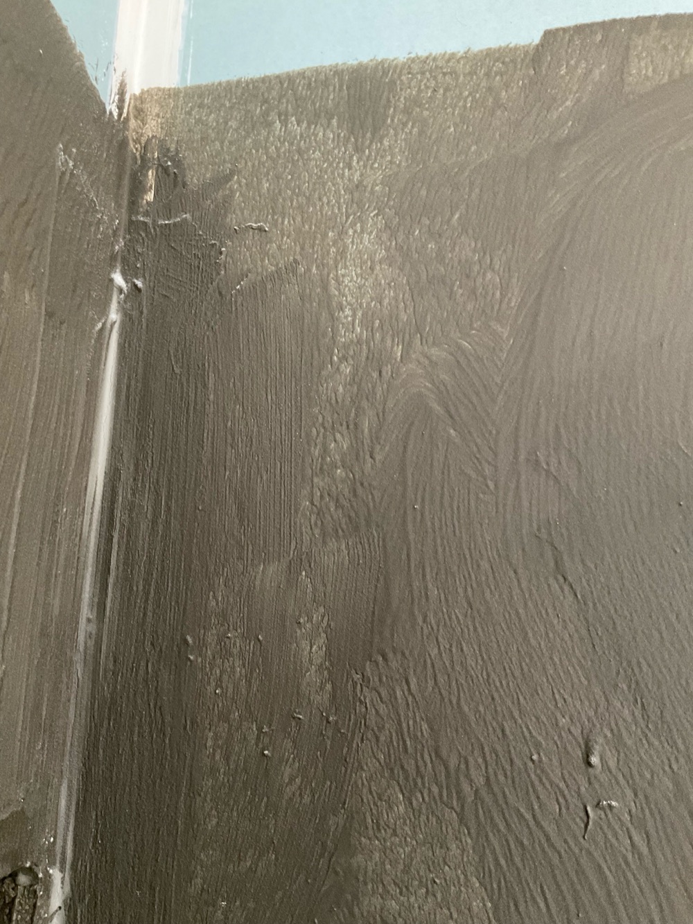 Waterproof membrane bare and starved across sections, recorded during a waterproofing inspection in Point Cook
